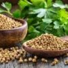 HarvestHavenGoods Premium Coriander Seeds white pouch pack beside a pile of whole sabut dhaniya — immunity anti-inflammatory natural healing spice India
